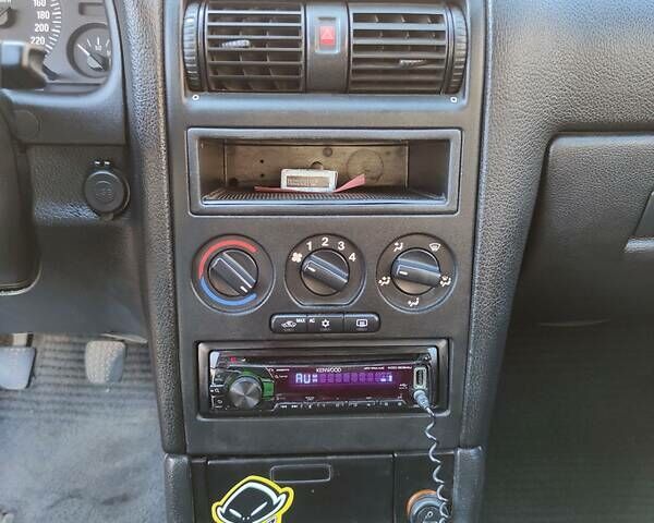 Зеленый Опель Астра, объемом двигателя 1.6 л и пробегом 230 тыс. км за 3500 $, фото 9 на Automoto.ua