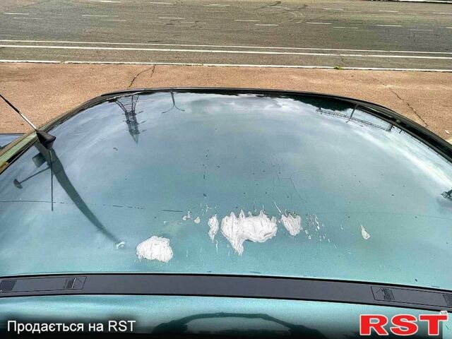 Зеленый Опель Астра, объемом двигателя 1.4 л и пробегом 235 тыс. км за 3000 $, фото 8 на Automoto.ua