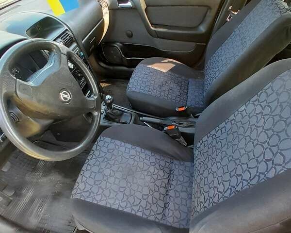 Зеленый Опель Астра, объемом двигателя 1.4 л и пробегом 290 тыс. км за 3150 $, фото 5 на Automoto.ua