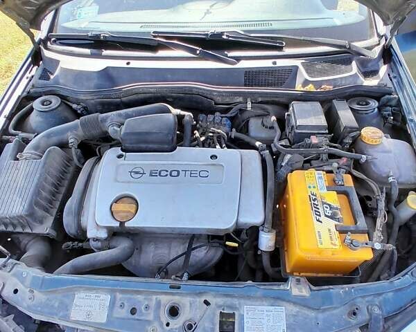 Зеленый Опель Астра, объемом двигателя 1.4 л и пробегом 290 тыс. км за 3150 $, фото 3 на Automoto.ua