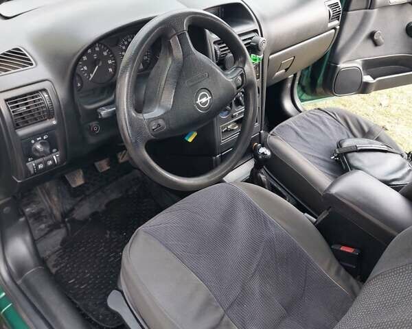 Зелений Опель Астра, об'ємом двигуна 1.39 л та пробігом 296 тис. км за 3500 $, фото 15 на Automoto.ua