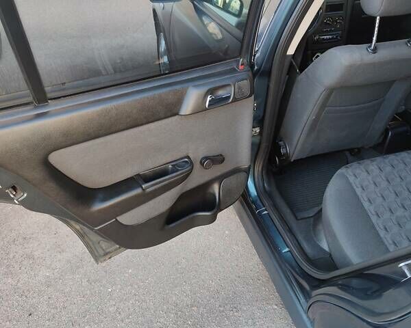 Зеленый Опель Астра, объемом двигателя 1.6 л и пробегом 230 тыс. км за 3500 $, фото 15 на Automoto.ua