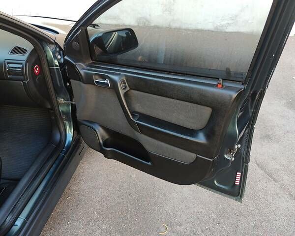 Зеленый Опель Астра, объемом двигателя 1.6 л и пробегом 230 тыс. км за 3500 $, фото 13 на Automoto.ua