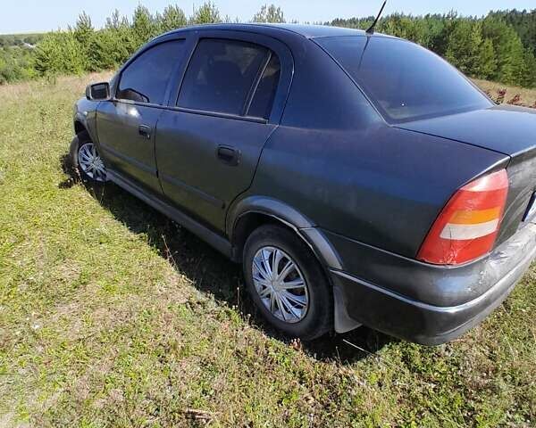 Зеленый Опель Астра, объемом двигателя 1.4 л и пробегом 290 тыс. км за 3150 $, фото 7 на Automoto.ua