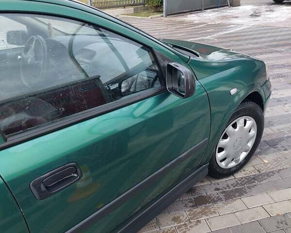 Зелений Опель Астра, об'ємом двигуна 1.39 л та пробігом 296 тис. км за 3500 $, фото 7 на Automoto.ua
