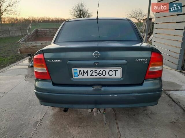 Зеленый Опель Астра, объемом двигателя 1.4 л и пробегом 301 тыс. км за 2700 $, фото 7 на Automoto.ua