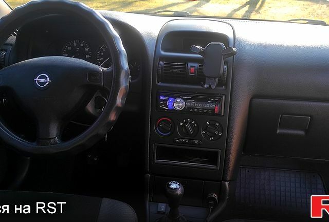 Зеленый Опель Астра, объемом двигателя 1.6 л и пробегом 310 тыс. км за 3200 $, фото 12 на Automoto.ua