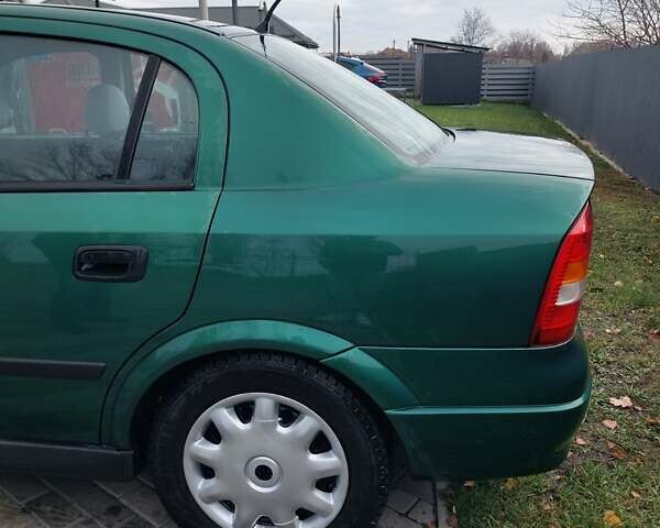 Зелений Опель Астра, об'ємом двигуна 1.39 л та пробігом 296 тис. км за 3500 $, фото 5 на Automoto.ua