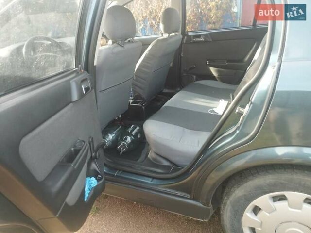 Зеленый Опель Астра, объемом двигателя 1.6 л и пробегом 180 тыс. км за 3500 $, фото 8 на Automoto.ua