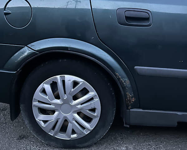 Зеленый Опель Астра, объемом двигателя 1.4 л и пробегом 350 тыс. км за 1999 $, фото 5 на Automoto.ua