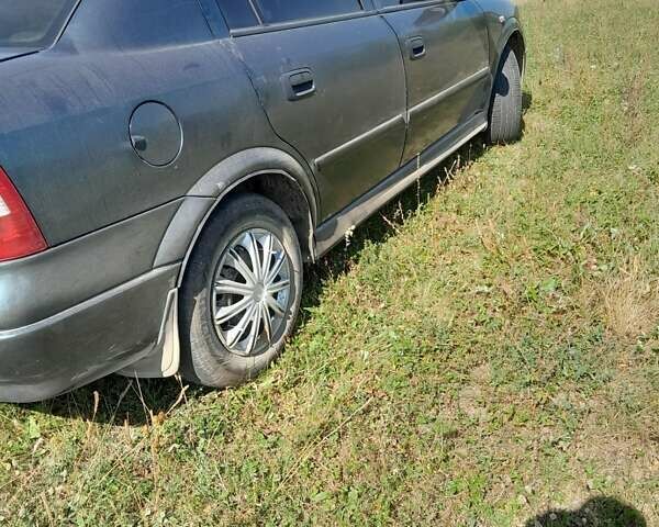 Зеленый Опель Астра, объемом двигателя 1.4 л и пробегом 290 тыс. км за 3150 $, фото 9 на Automoto.ua