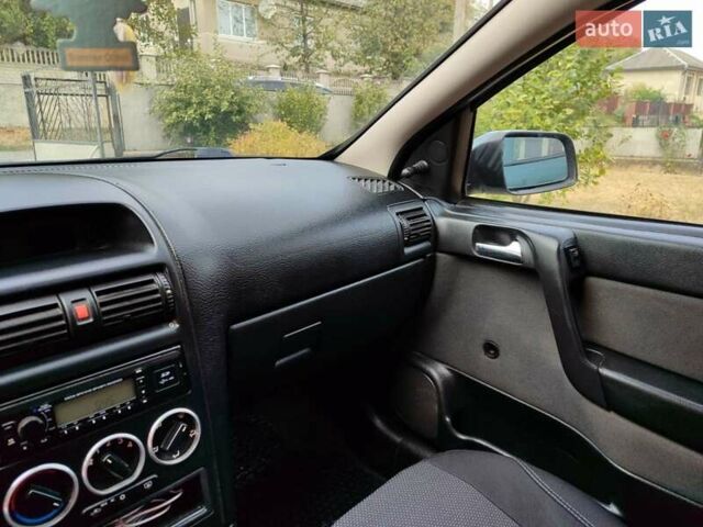 Зеленый Опель Астра, объемом двигателя 1.4 л и пробегом 182 тыс. км за 3500 $, фото 14 на Automoto.ua