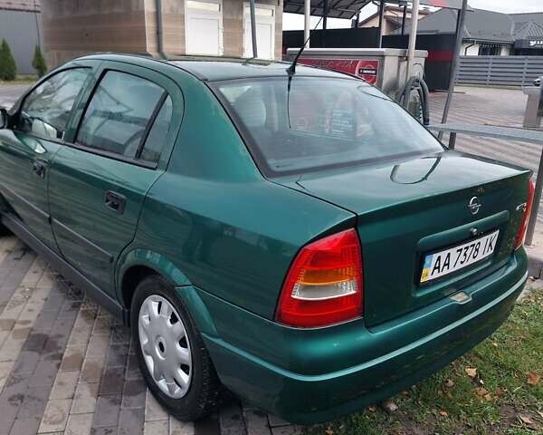 Зелений Опель Астра, об'ємом двигуна 1.39 л та пробігом 296 тис. км за 3500 $, фото 4 на Automoto.ua