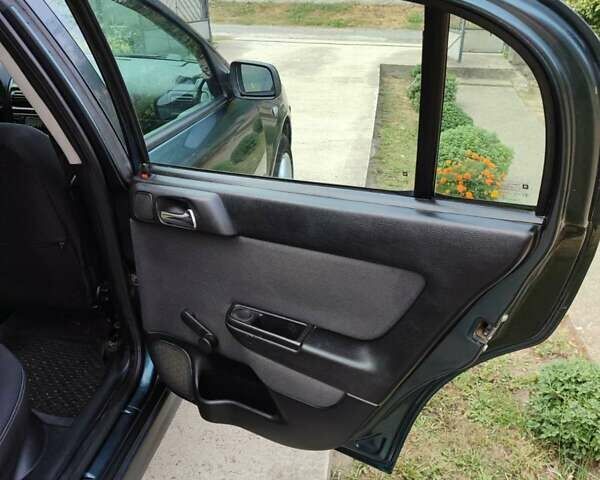 Зеленый Опель Астра, объемом двигателя 1.4 л и пробегом 182 тыс. км за 3500 $, фото 19 на Automoto.ua