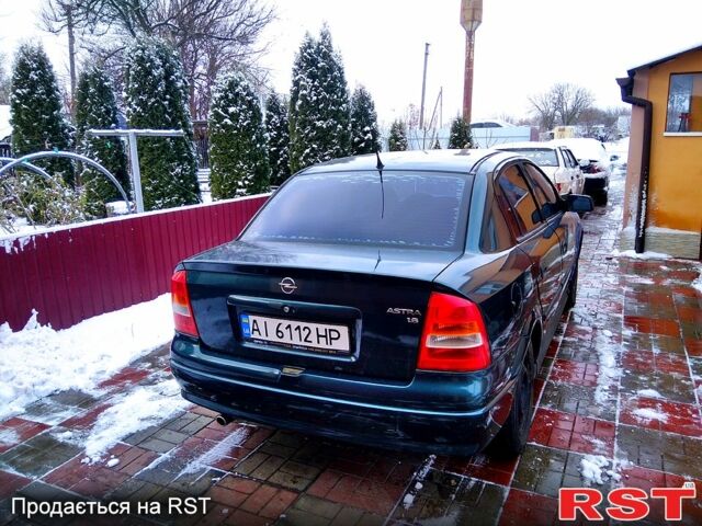 Зелений Опель Астра, об'ємом двигуна 1.6 л та пробігом 276 тис. км за 1100 $, фото 5 на Automoto.ua