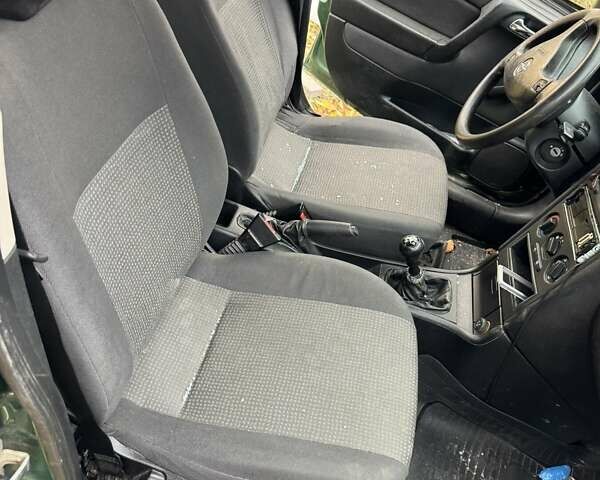 Зелений Опель Астра, об'ємом двигуна 1.4 л та пробігом 278 тис. км за 1050 $, фото 5 на Automoto.ua