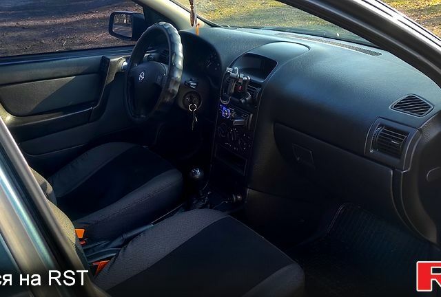 Зеленый Опель Астра, объемом двигателя 1.6 л и пробегом 310 тыс. км за 3200 $, фото 11 на Automoto.ua