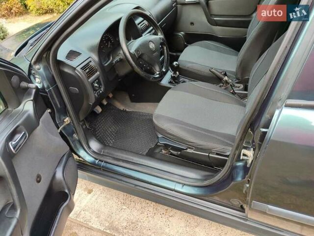 Зеленый Опель Астра, объемом двигателя 1.4 л и пробегом 182 тыс. км за 3500 $, фото 7 на Automoto.ua