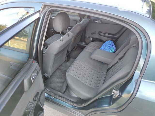 Зеленый Опель Астра, объемом двигателя 1.6 л и пробегом 230 тыс. км за 3500 $, фото 14 на Automoto.ua