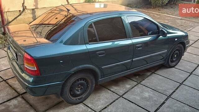Зеленый Опель Астра, объемом двигателя 1.4 л и пробегом 320 тыс. км за 3400 $, фото 1 на Automoto.ua