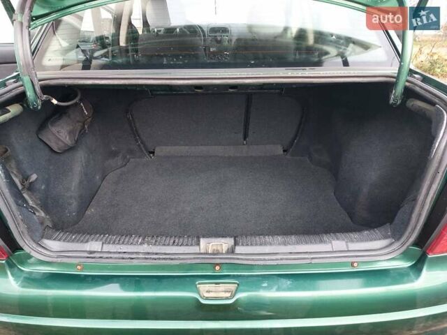 Зелений Опель Астра, об'ємом двигуна 1.39 л та пробігом 296 тис. км за 3500 $, фото 10 на Automoto.ua