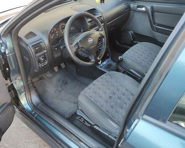 Зеленый Опель Астра, объемом двигателя 1.6 л и пробегом 230 тыс. км за 3500 $, фото 7 на Automoto.ua