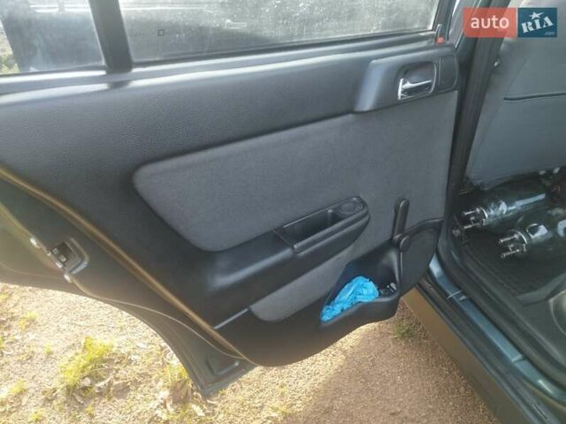 Зеленый Опель Астра, объемом двигателя 1.6 л и пробегом 180 тыс. км за 3500 $, фото 9 на Automoto.ua