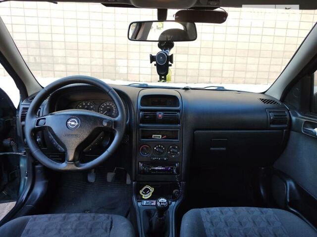 Зеленый Опель Астра, объемом двигателя 1.6 л и пробегом 230 тыс. км за 3500 $, фото 10 на Automoto.ua