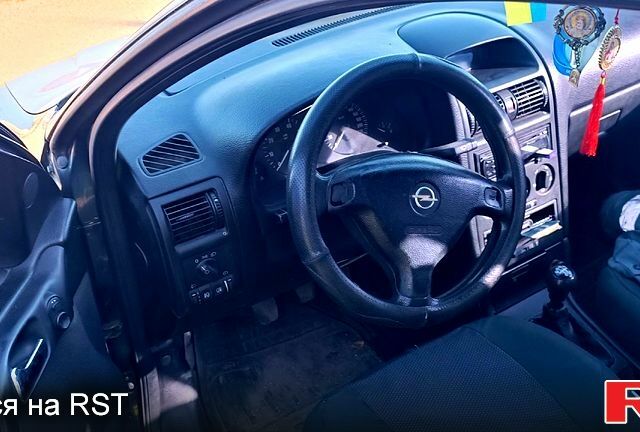 Зеленый Опель Астра, объемом двигателя 1.6 л и пробегом 250 тыс. км за 4250 $, фото 5 на Automoto.ua