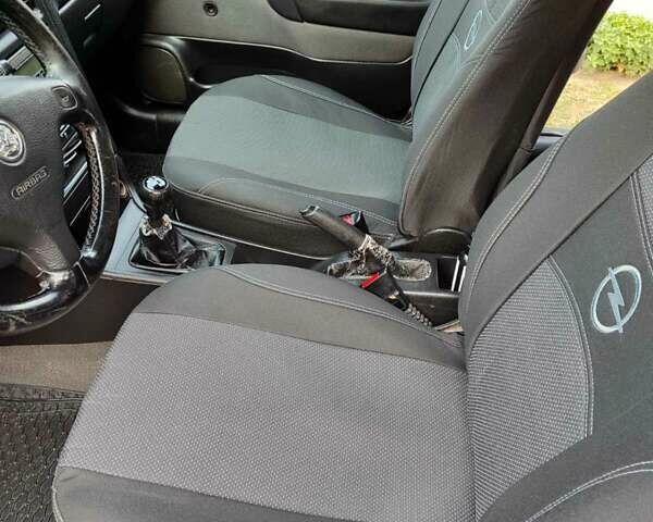 Зеленый Опель Астра, объемом двигателя 1.4 л и пробегом 182 тыс. км за 3500 $, фото 17 на Automoto.ua