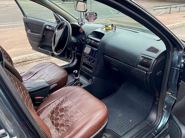 Зеленый Опель Астра, объемом двигателя 1.4 л и пробегом 235 тыс. км за 3000 $, фото 3 на Automoto.ua