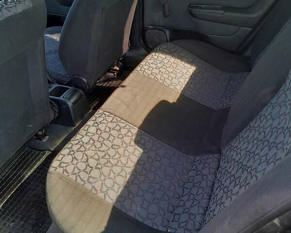 Зеленый Опель Астра, объемом двигателя 1.4 л и пробегом 290 тыс. км за 3150 $, фото 2 на Automoto.ua