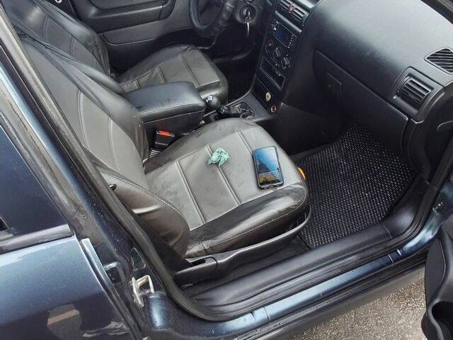 Зелений Опель Астра, об'ємом двигуна 1.4 л та пробігом 200 тис. км за 3000 $, фото 5 на Automoto.ua