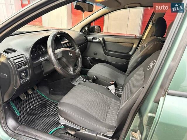 Зелений Опель Астра, об'ємом двигуна 1.4 л та пробігом 273 тис. км за 3800 $, фото 27 на Automoto.ua
