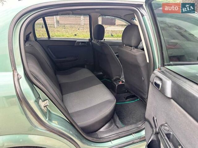 Зелений Опель Астра, об'ємом двигуна 1.4 л та пробігом 273 тис. км за 3800 $, фото 18 на Automoto.ua