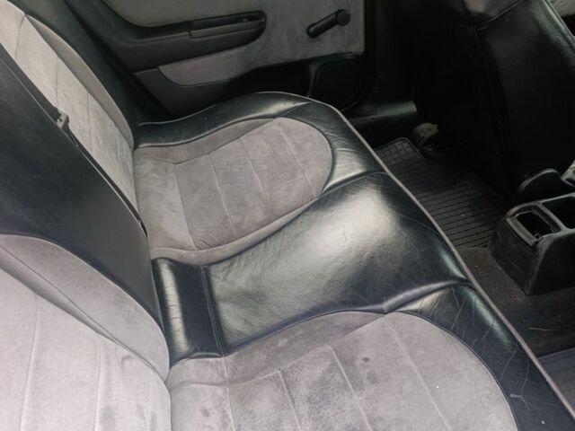 Зелений Опель Астра, об'ємом двигуна 1.4 л та пробігом 200 тис. км за 2300 $, фото 1 на Automoto.ua