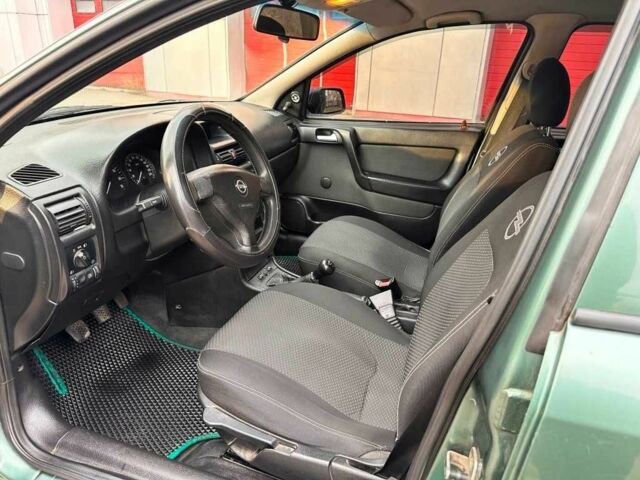 Зелений Опель Астра, об'ємом двигуна 1.4 л та пробігом 274 тис. км за 3800 $, фото 11 на Automoto.ua