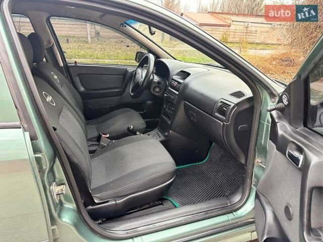 Зелений Опель Астра, об'ємом двигуна 1.4 л та пробігом 273 тис. км за 3800 $, фото 19 на Automoto.ua