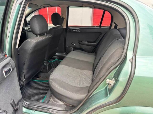 Зелений Опель Астра, об'ємом двигуна 1.4 л та пробігом 274 тис. км за 3800 $, фото 21 на Automoto.ua