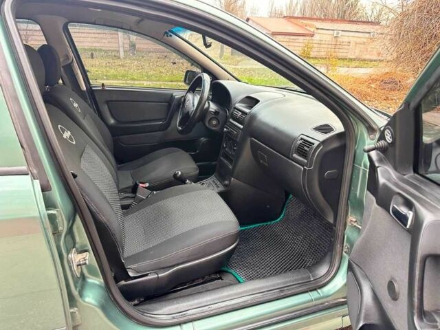 Зелений Опель Астра, об'ємом двигуна 1.4 л та пробігом 274 тис. км за 3800 $, фото 20 на Automoto.ua