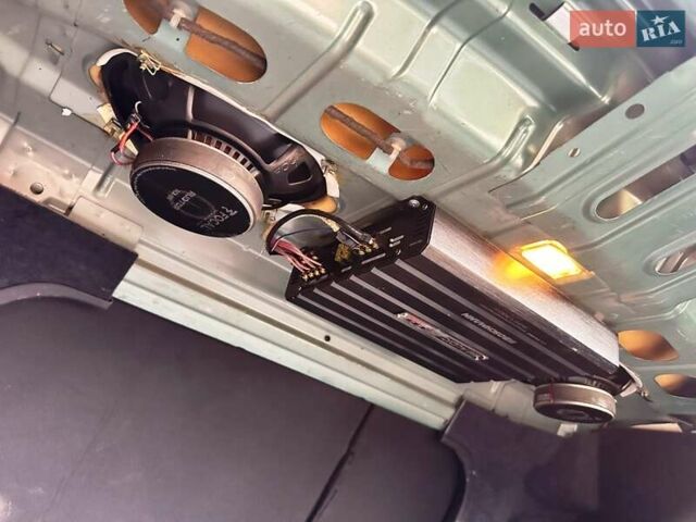 Зелений Опель Астра, об'ємом двигуна 1.4 л та пробігом 273 тис. км за 3800 $, фото 28 на Automoto.ua