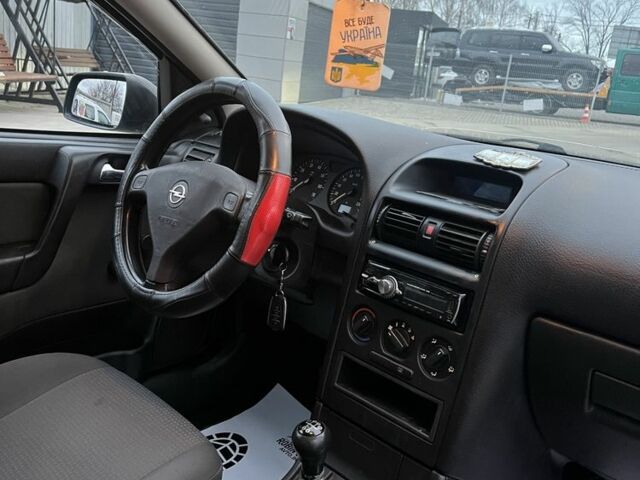 Зеленый Опель Астра, объемом двигателя 1.4 л и пробегом 195 тыс. км за 4000 $, фото 18 на Automoto.ua