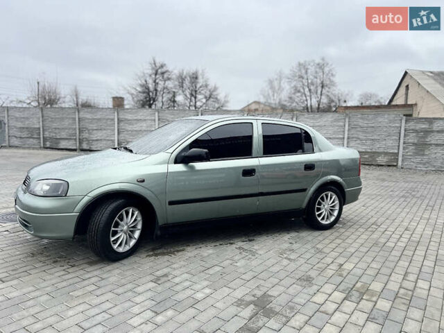 Зеленый Опель Астра, объемом двигателя 1.4 л и пробегом 350 тыс. км за 4700 $, фото 2 на Automoto.ua