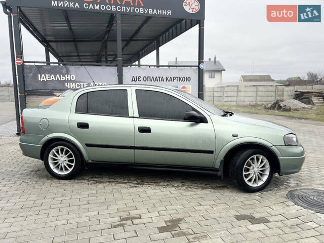 Зеленый Опель Астра, объемом двигателя 1.4 л и пробегом 350 тыс. км за 4700 $, фото 3 на Automoto.ua