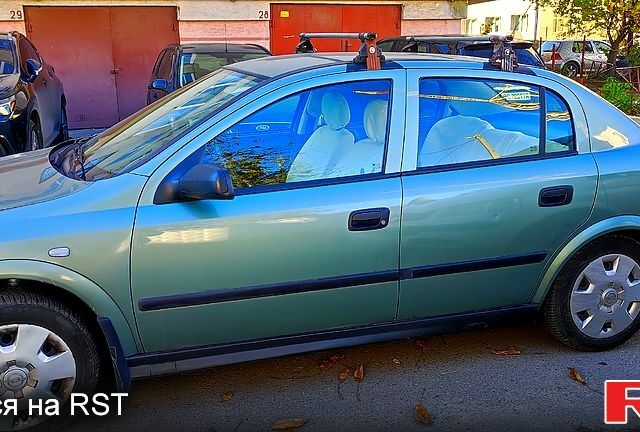 Зелений Опель Астра, об'ємом двигуна 1.4 л та пробігом 136 тис. км за 3150 $, фото 9 на Automoto.ua