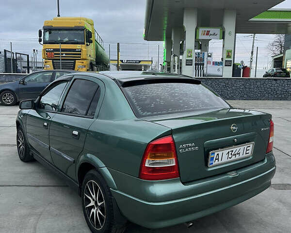 Зеленый Опель Астра, объемом двигателя 1.39 л и пробегом 195 тыс. км за 4000 $, фото 10 на Automoto.ua