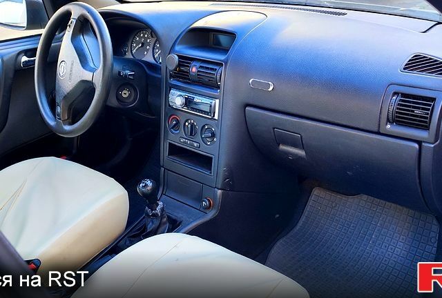 Зелений Опель Астра, об'ємом двигуна 1.4 л та пробігом 136 тис. км за 3150 $, фото 6 на Automoto.ua