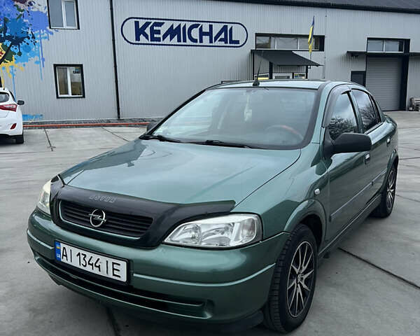 Зеленый Опель Астра, объемом двигателя 1.39 л и пробегом 195 тыс. км за 4000 $, фото 1 на Automoto.ua
