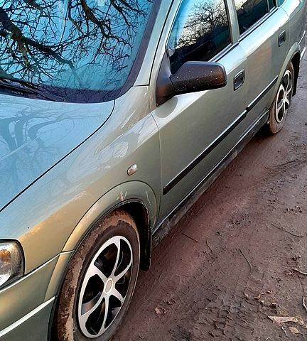 Зеленый Опель Астра, объемом двигателя 1.4 л и пробегом 230 тыс. км за 3500 $, фото 3 на Automoto.ua