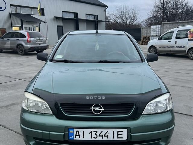Зеленый Опель Астра, объемом двигателя 1.4 л и пробегом 195 тыс. км за 4000 $, фото 2 на Automoto.ua